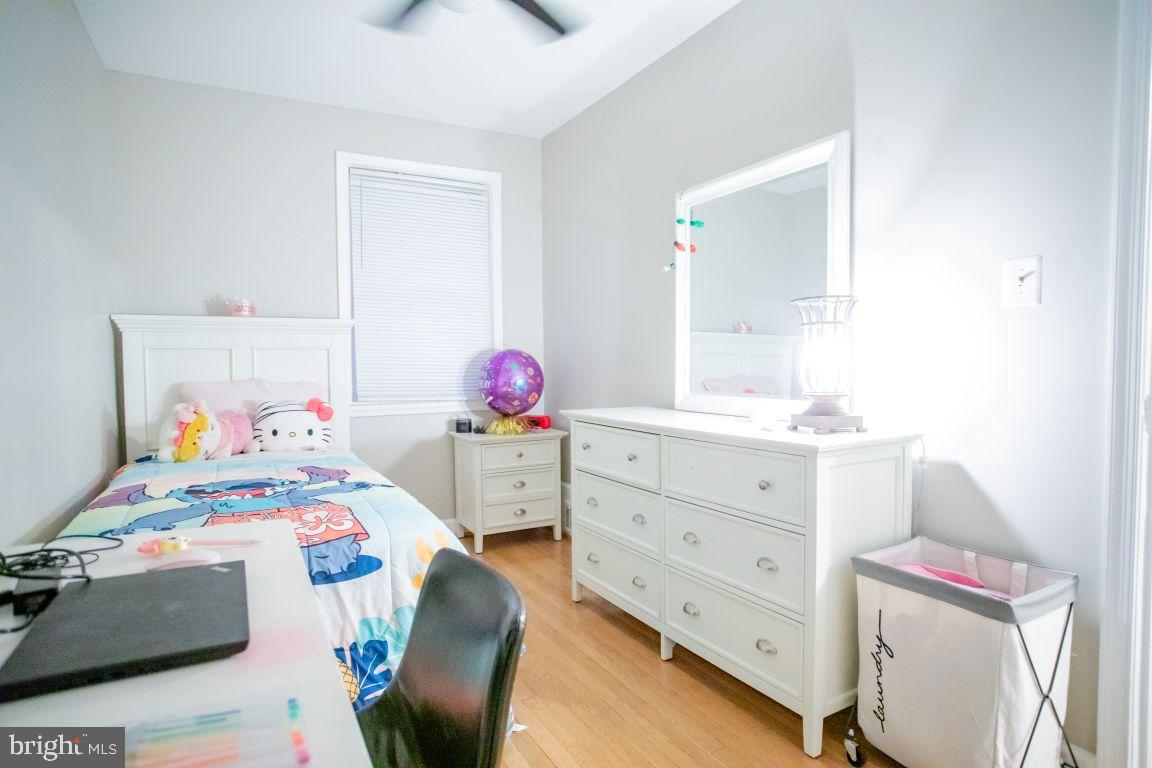 3913 Q Street Southeast Washington, DC 20020 - Photo 26 of 31 a bedroom with a bed and furniture