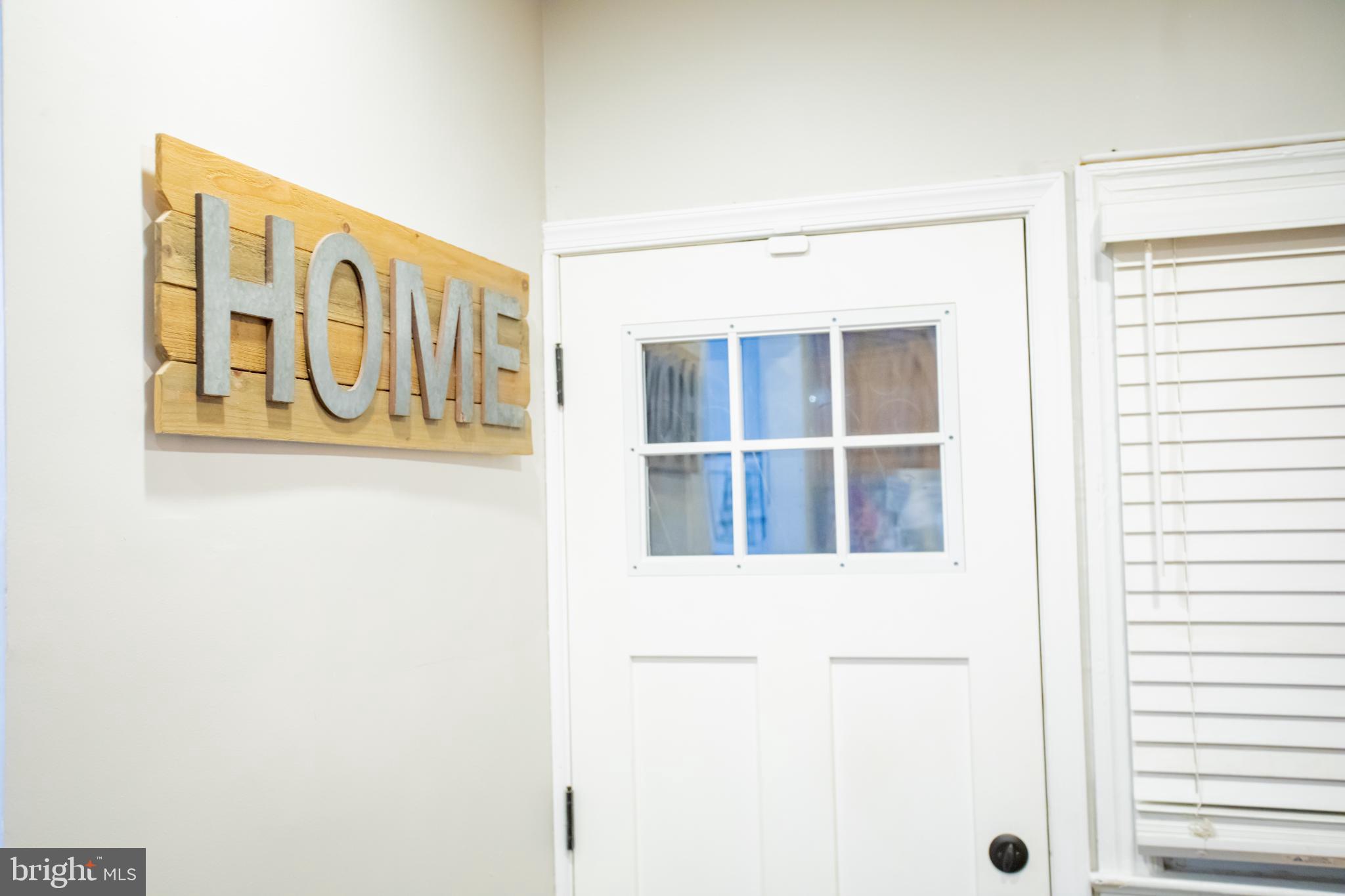 3913 Q Street Southeast Washington, DC 20020 - Photo 9 of 31 a view of a door and a window