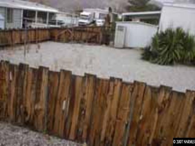 15015 Vega Street Reno, NV 89521 - Photo 3 of 9 a view of balcony with wooden fence
