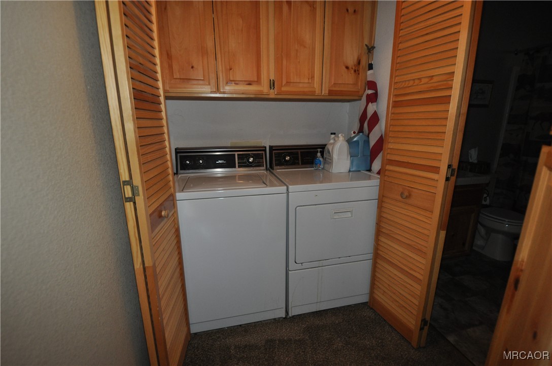 1419 Klamath Road Big Bear City, CA 92314 - Photo 18 of 31 a utility room with dryer and washer