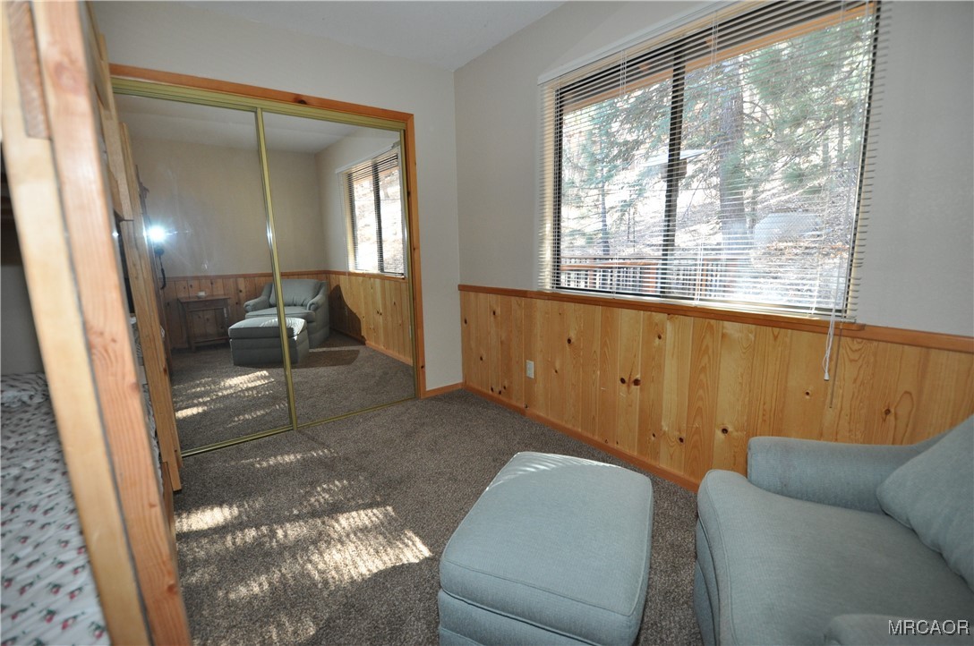 1419 Klamath Road Big Bear City, CA 92314 - Photo 20 of 31 a living room with furniture and a large window
