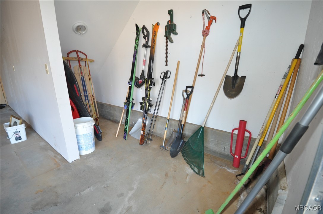 1419 Klamath Road Big Bear City, CA 92314 - Photo 30 of 31 a view of walk in closet with clothes