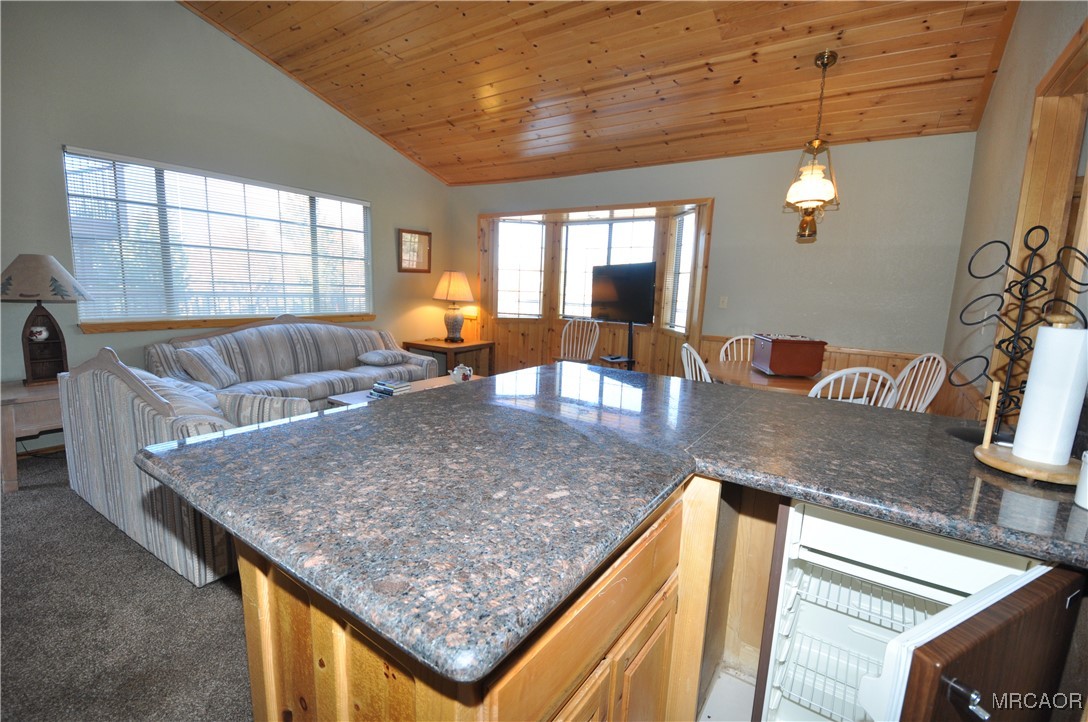 1419 Klamath Road Big Bear City, CA 92314 - Photo 9 of 31 a living room with stainless steel appliances granite countertop sink and a couch