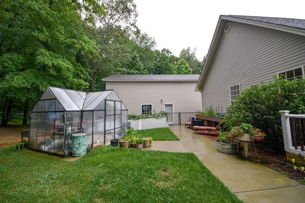 2294 Old Federal Road Ocoee, TN 37361 - Photo 54 of 70 a view of a house with backyard and sitting area
