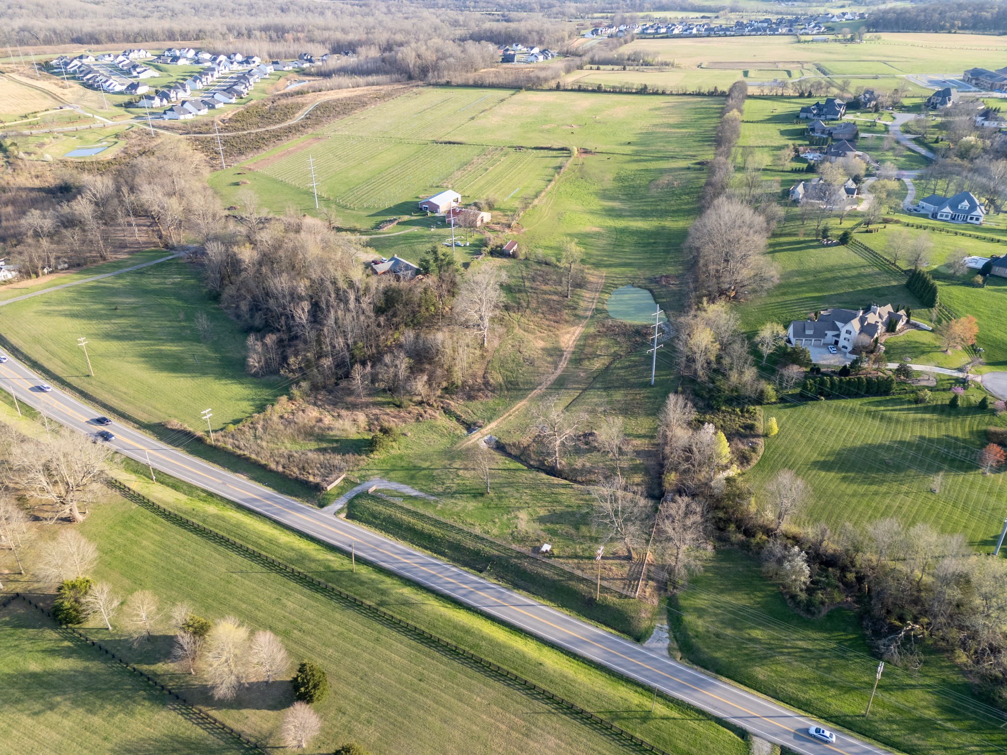 4891 Murfreesboro Road Arrington, TN 37014 - Photo 3 of 14 a view of a lake from a yard