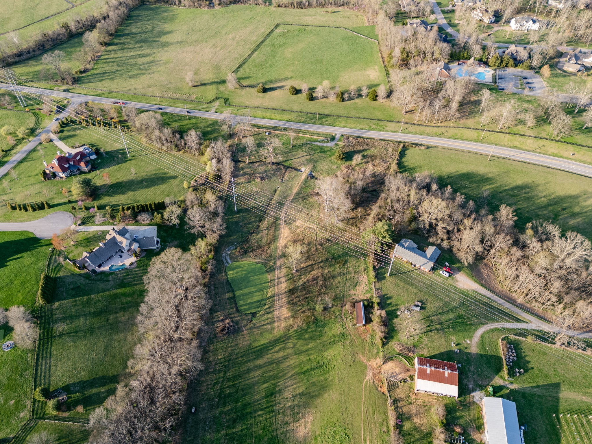 4891 Murfreesboro Road Arrington, TN 37014 - Photo 6 of 14 a view of a lake with a yard