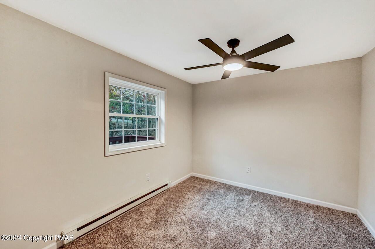 2228 Southport Drive Bushkill, PA 18324 - Photo 19 of 56 a view of an empty room with a window
