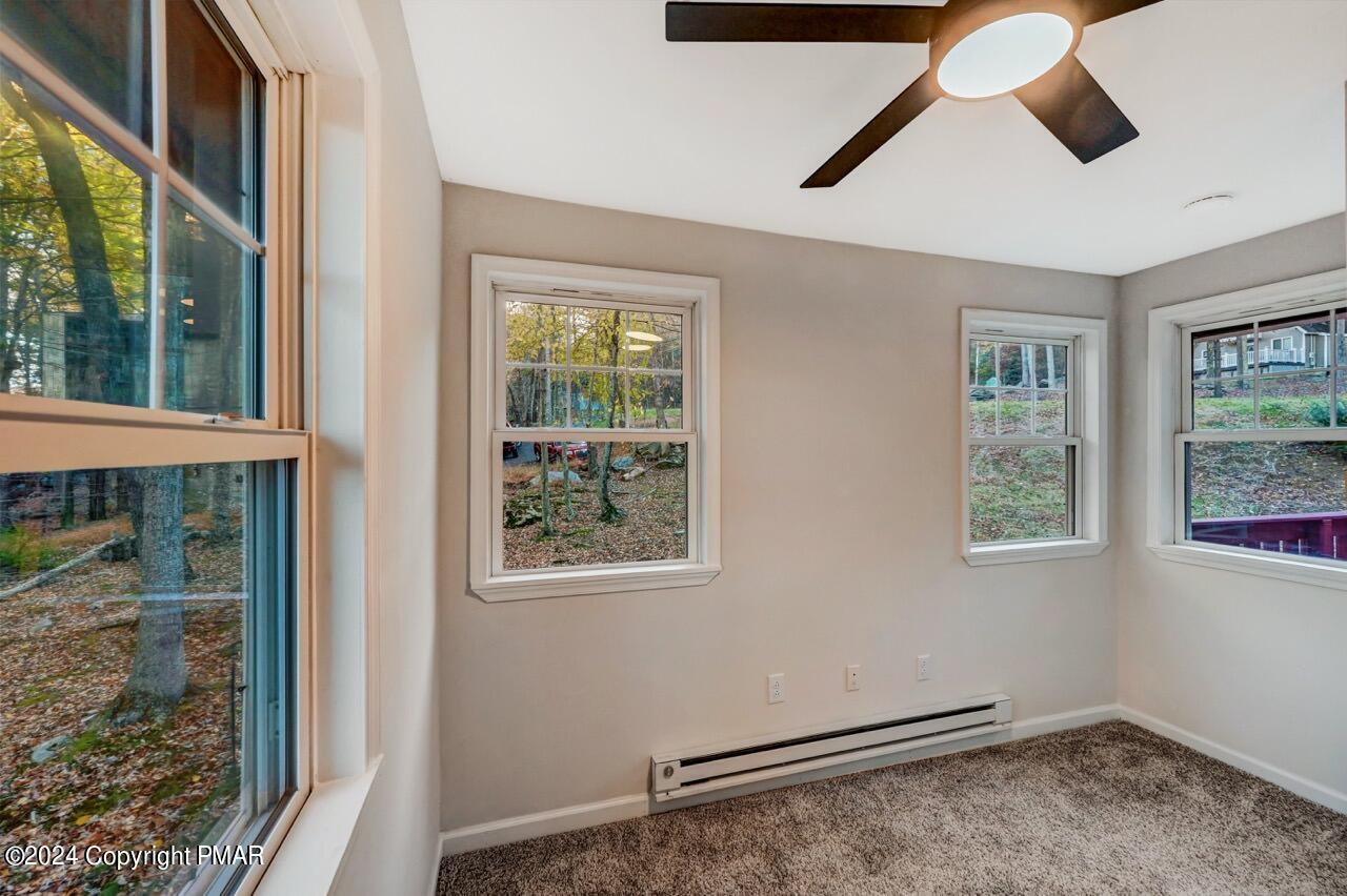 2228 Southport Drive Bushkill, PA 18324 - Photo 26 of 56 a view of room with window and ceiling fan