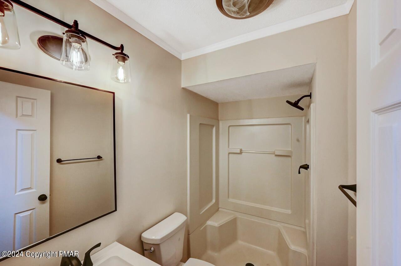 2228 Southport Drive Bushkill, PA 18324 - Photo 35 of 56 a bathroom with a toilet and a shower