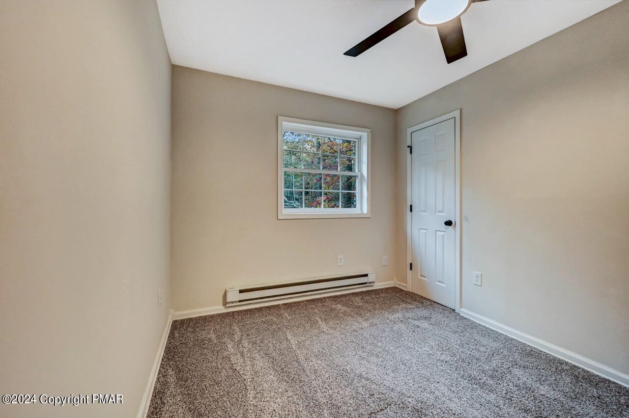 2228 Southport Drive Bushkill, PA 18324 - Photo 40 of 56 a view of an empty room with a window