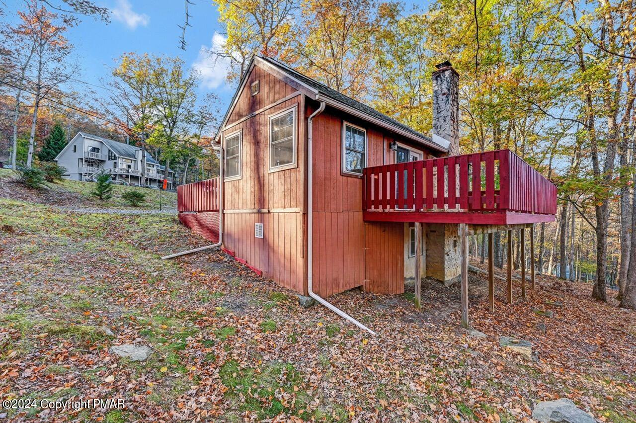 2228 Southport Drive Bushkill, PA 18324 - Photo 53 of 56 a view of a house with backyard and wooden fence