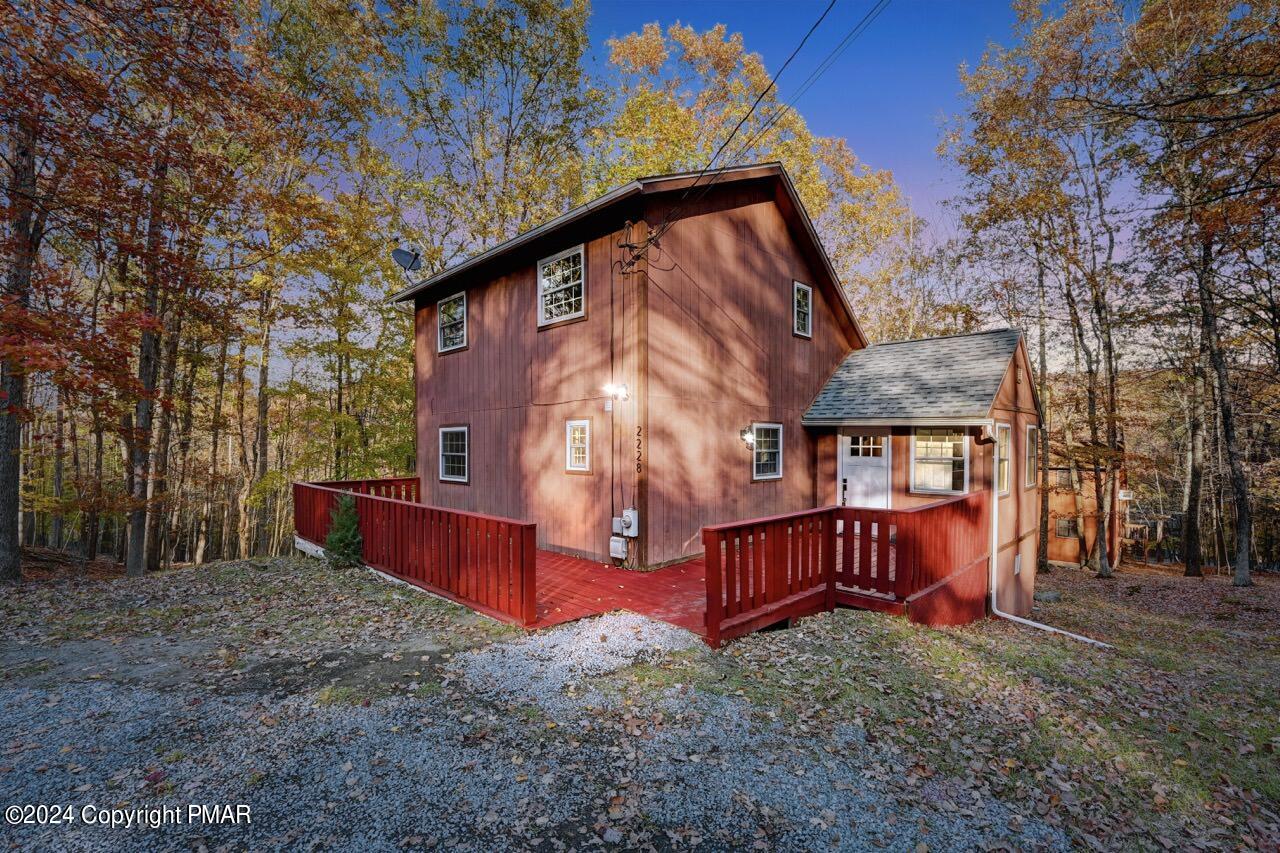 2228 Southport Drive Bushkill, PA 18324 - Photo 55 of 56 a view of a house with a yard