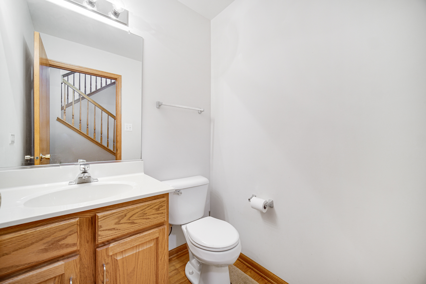 11837 Somerset Road Orland Park, IL 60467 - Photo 14 of 26 a bathroom with a sink and a toilet