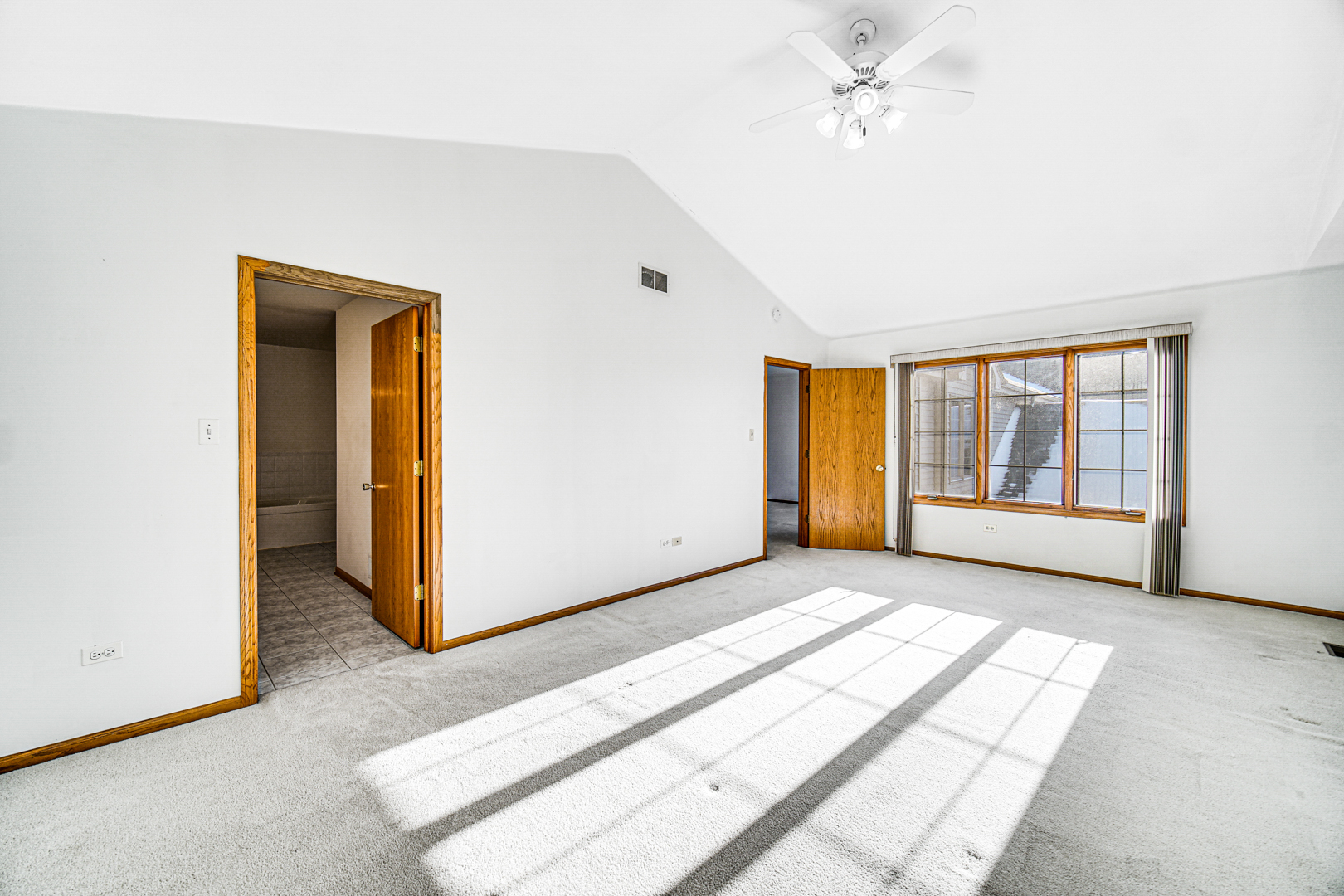 11837 Somerset Road Orland Park, IL 60467 - Photo 18 of 26 a view of a room with wooden floor and windows
