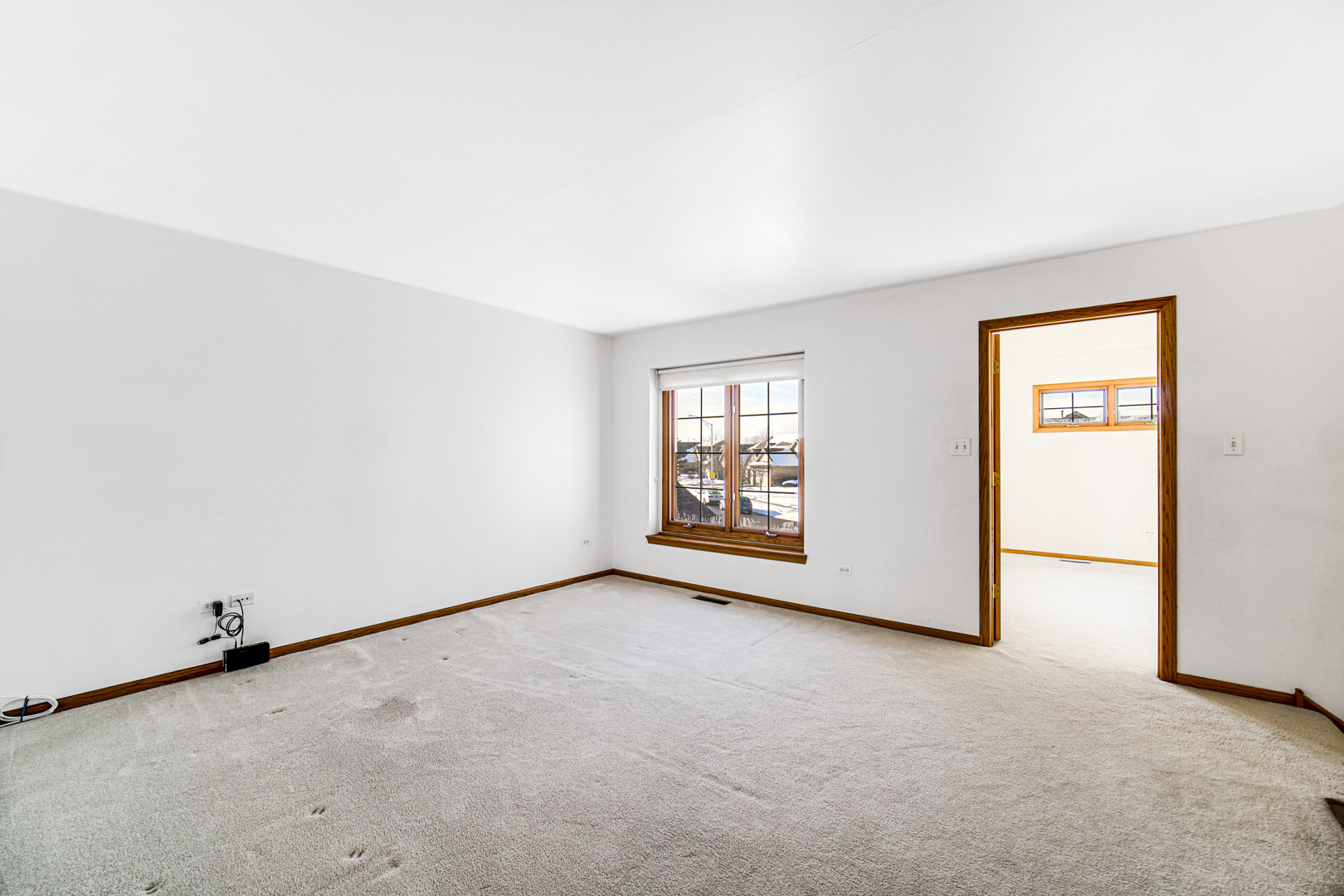 11837 Somerset Road Orland Park, IL 60467 - Photo 20 of 26 an empty room with windows