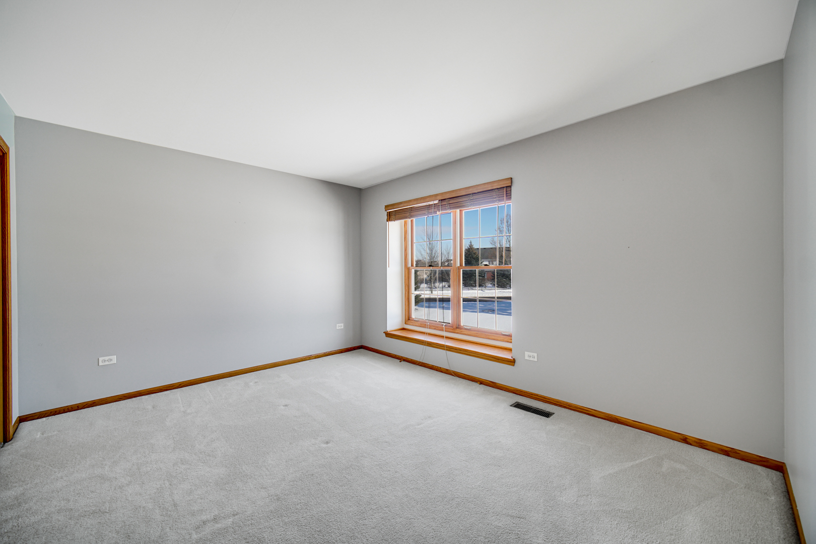 11837 Somerset Road Orland Park, IL 60467 - Photo 22 of 26 a view of an empty room with a window