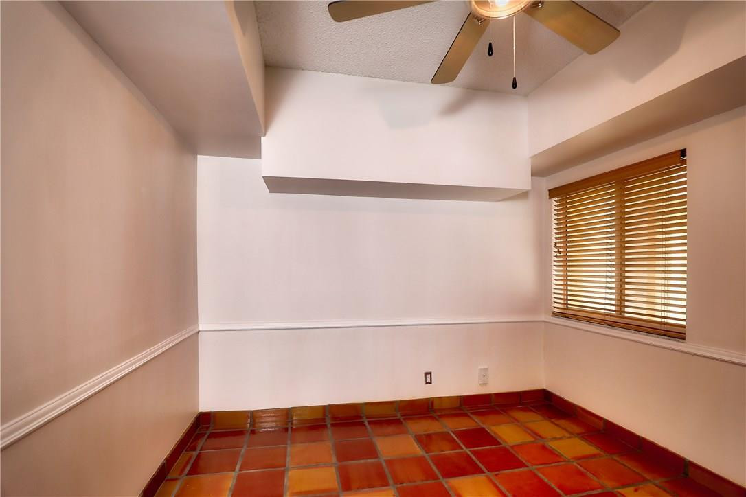 23085 Aqua View, Unit 7 Boca Raton, FL 33433 - Photo 7 of 22 a view of a room with wooden floor and white walls