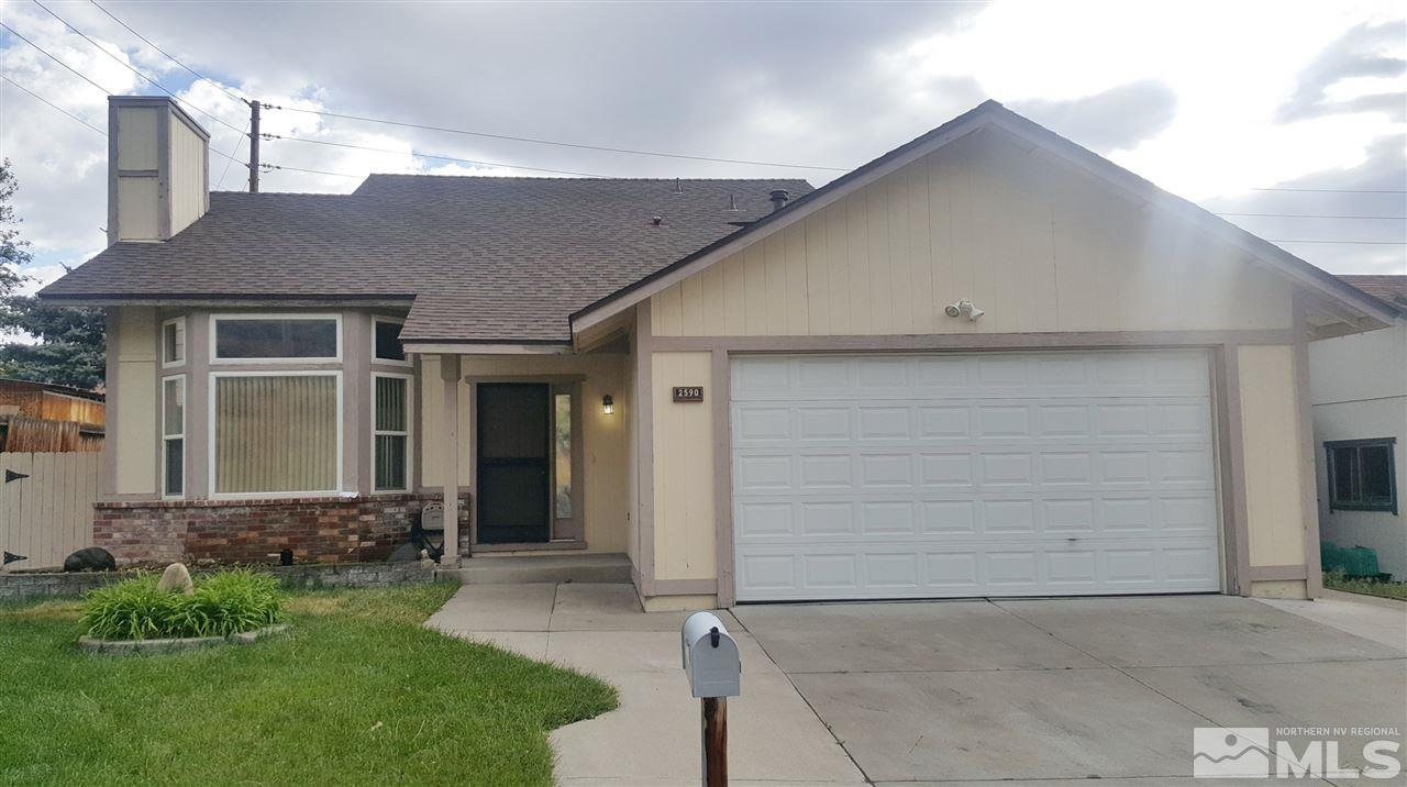 2590 Keystone Avenue Reno, NV 89503 - Photo 1 of 1 front view of a house with a yard