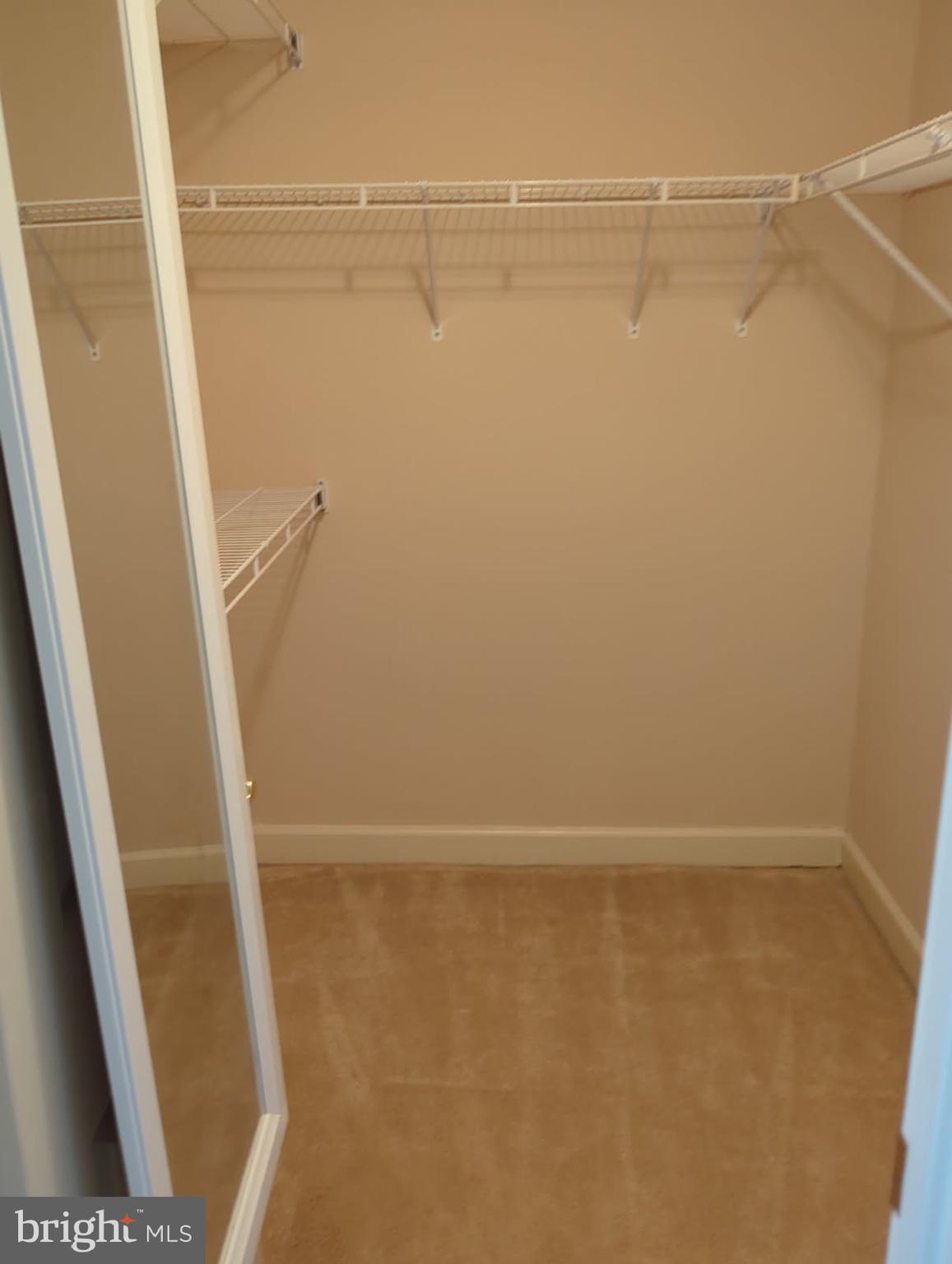 11223 Watermill Lane Silver Spring, MD 20902 - Photo 12 of 20 a view of walk in closet