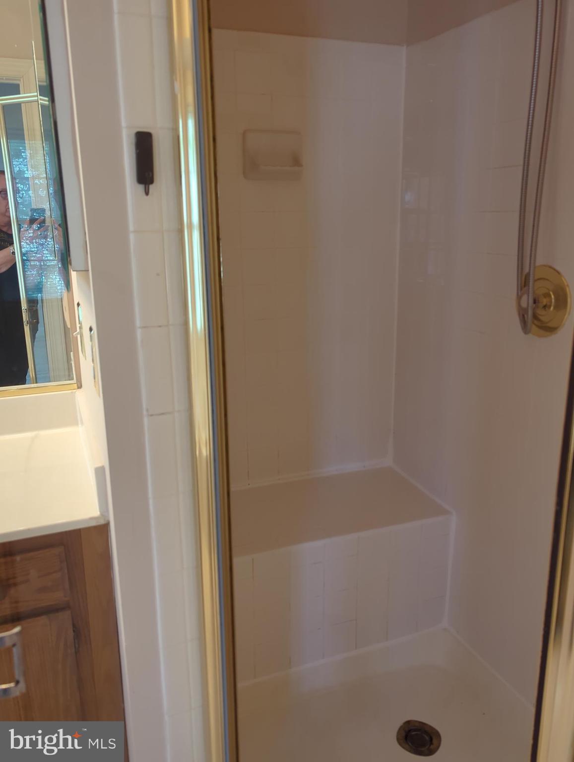 11223 Watermill Lane Silver Spring, MD 20902 - Photo 15 of 20 a bathroom with a shower