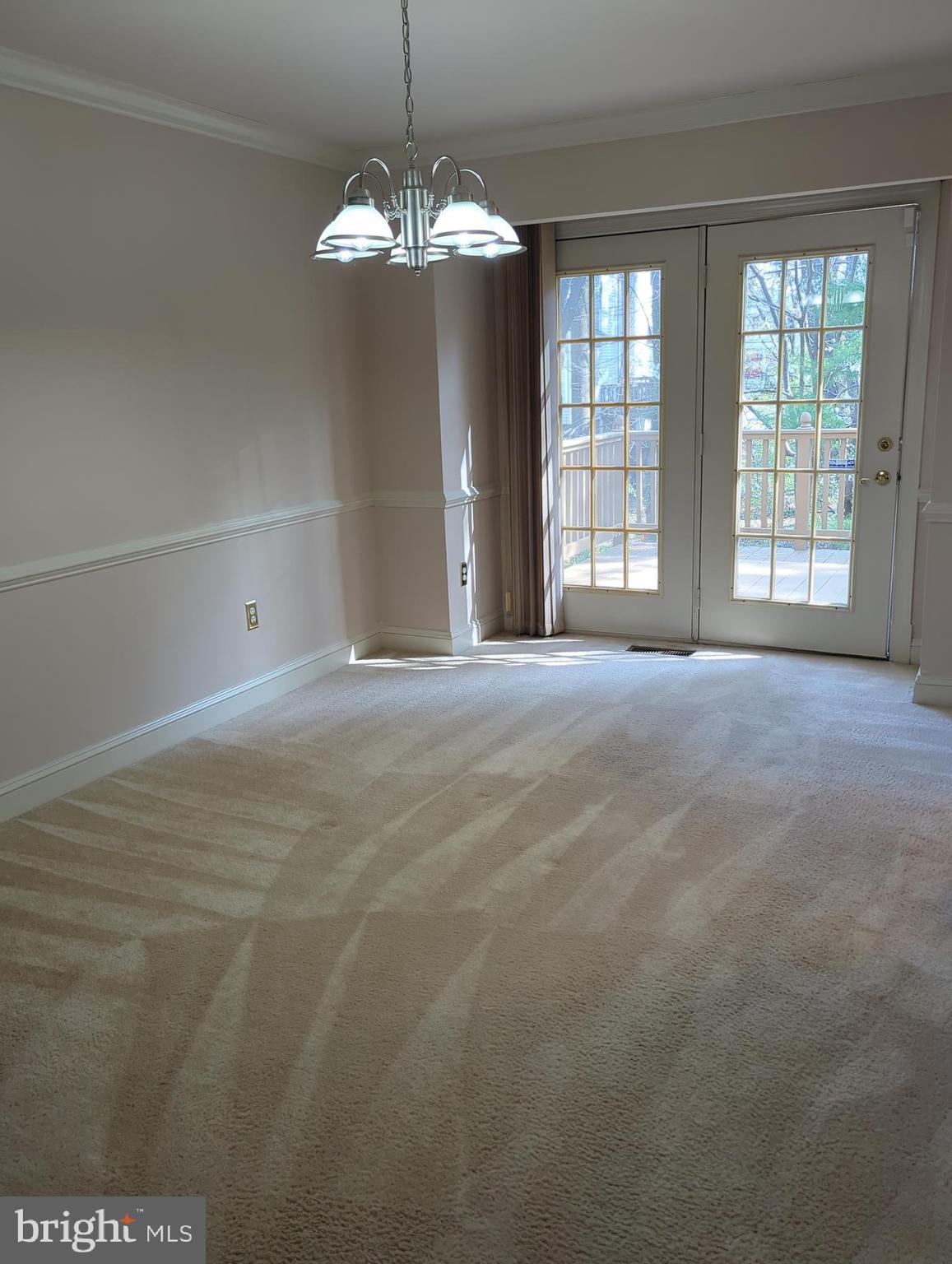 11223 Watermill Lane Silver Spring, MD 20902 - Photo 8 of 20 a view of an empty room with a window