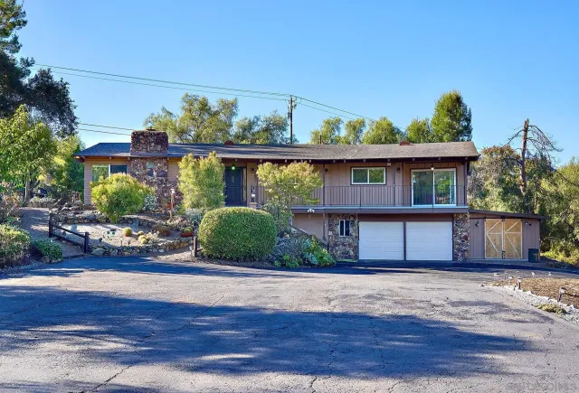 a front view of a house with porch
