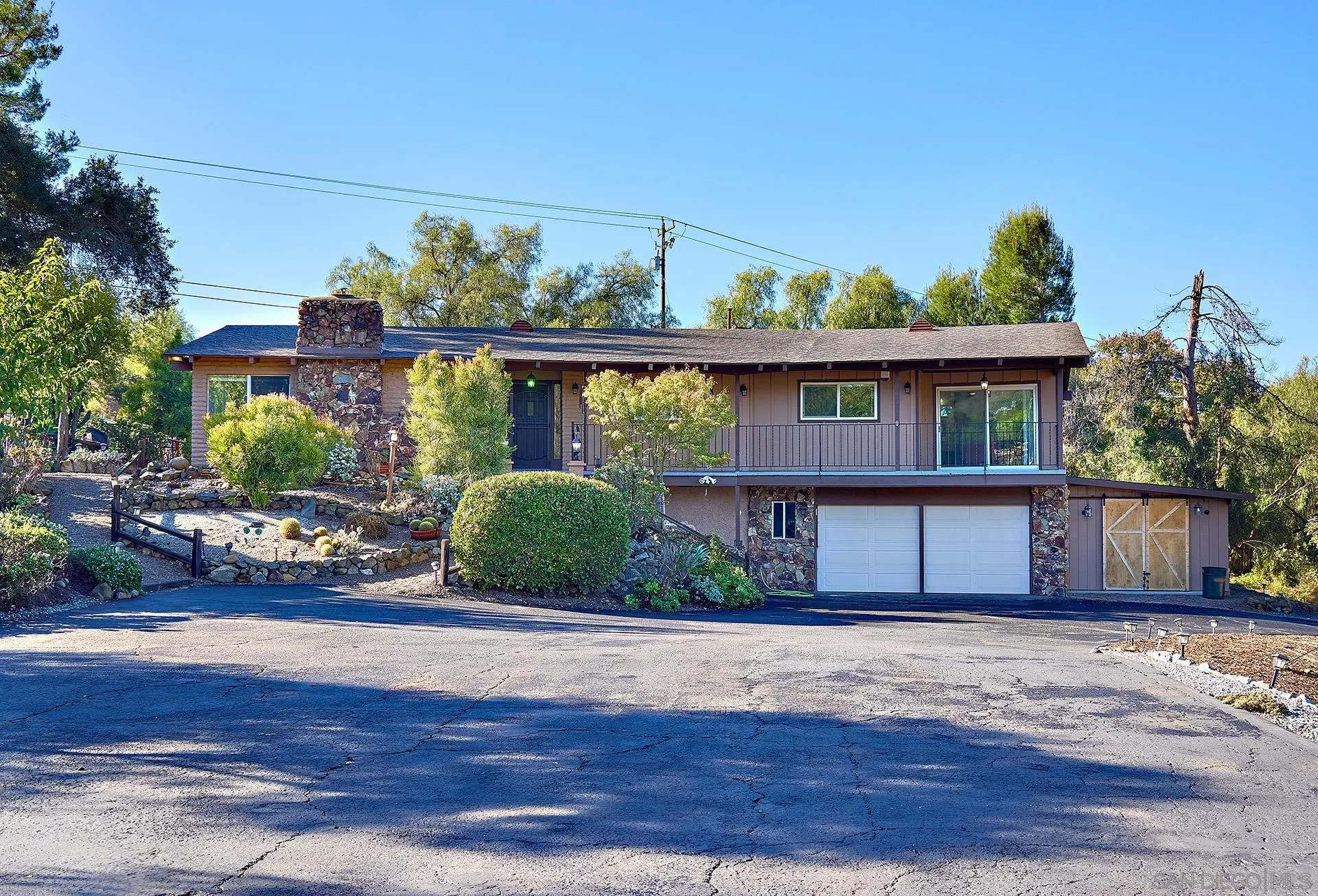 a front view of a house with porch