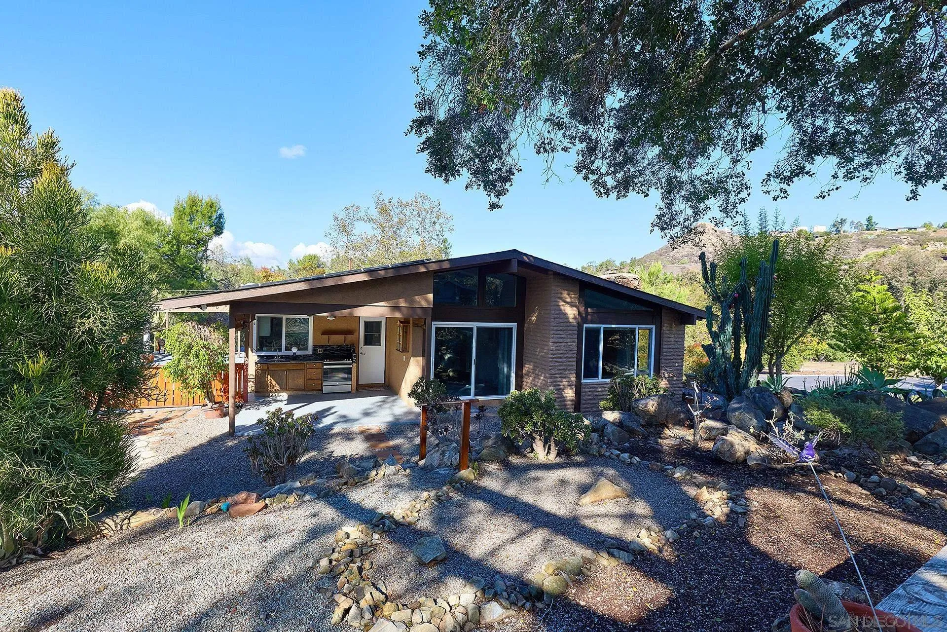 15260 Vali Hai Road Poway, CA 92064 - Photo 17 of 40 a house view with a garden space