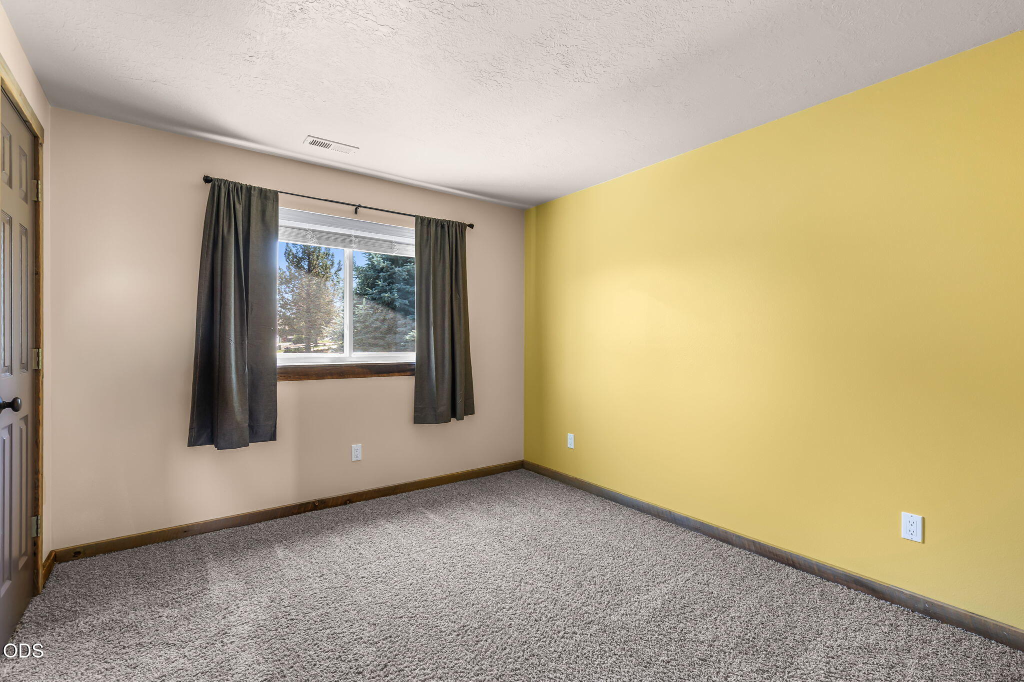 2486 Southwest Valleyview Drive Redmond, OR 97756 - Photo 36 of 55 a view of an empty room with a window