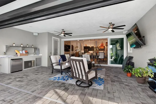 a bedroom with a bed and lamp