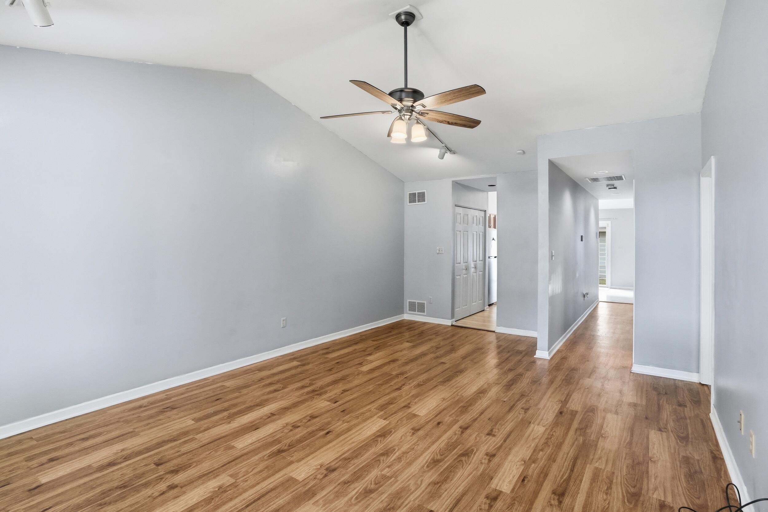 225 Clinton Street Lowell, IN 46356 - Photo 6 of 22 a view of an empty room and wooden floor
