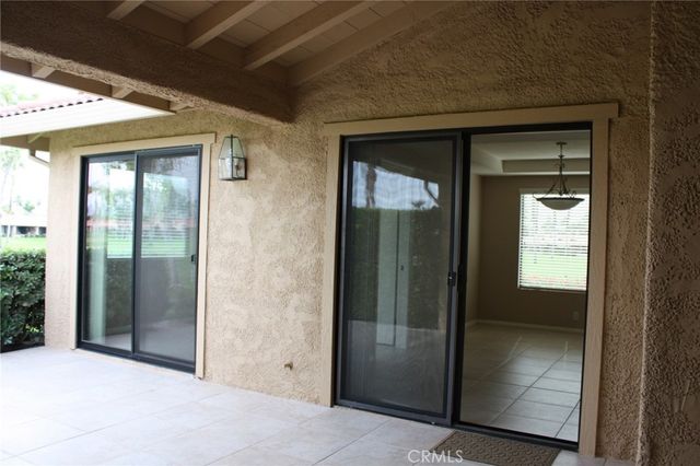 a view of elevator with hallway