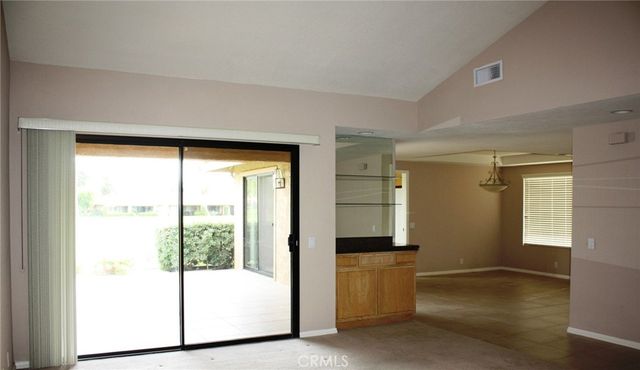 a view of a room with a large window