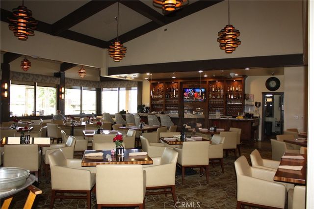 a room with gym equipment and a large window