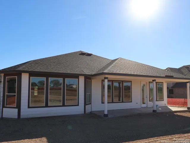 a house with trees in front of it