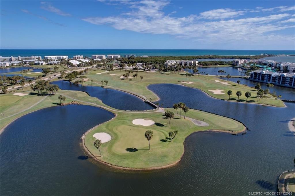 5564 Northeast Gulfstream Way Stuart, FL 34996 - Photo 37 of 41 an aerial view of a swimming pool and outdoor space