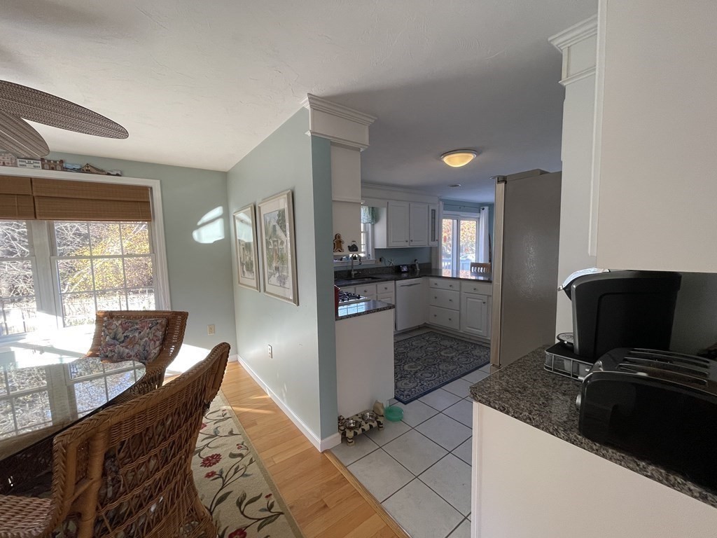 5 Collins Circle Weymouth, MA 02190 - Photo 20 of 42 a kitchen with granite countertop a refrigerator stove and sink