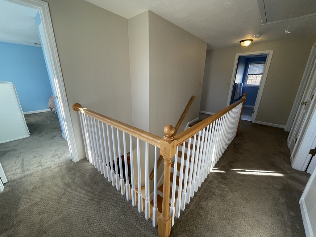 5 Collins Circle Weymouth, MA 02190 - Photo 26 of 42 a view of a hallway with stairs