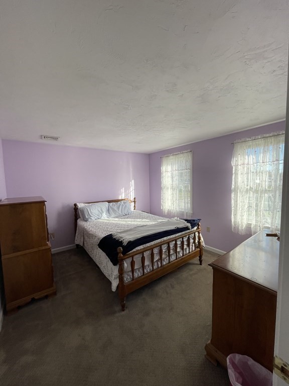 5 Collins Circle Weymouth, MA 02190 - Photo 30 of 42 a bedroom with a bed and window