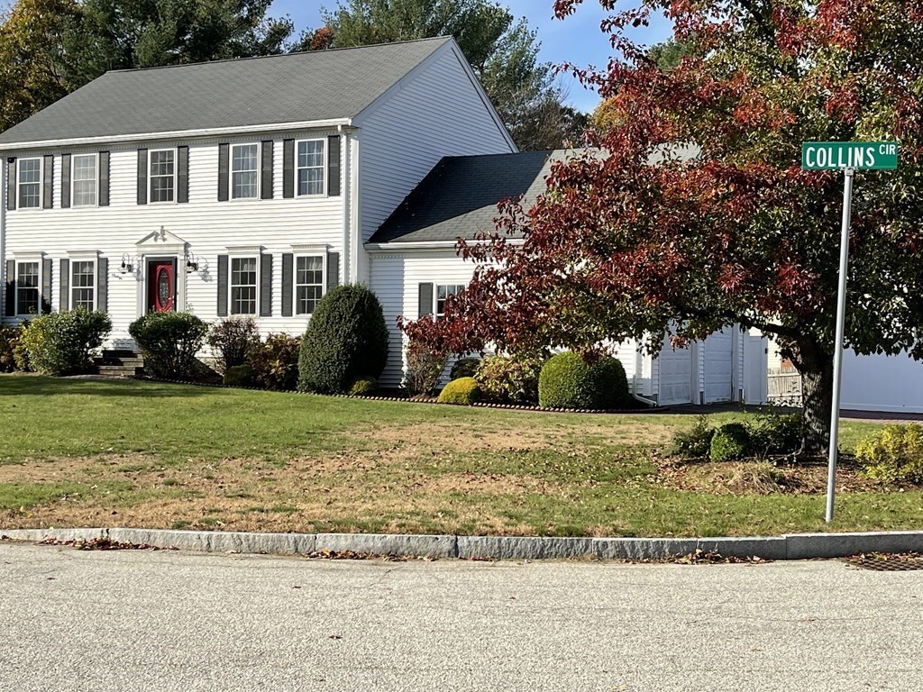 5 Collins Circle Weymouth, MA 02190 - Photo 3 of 42 a front view of a house with a garden