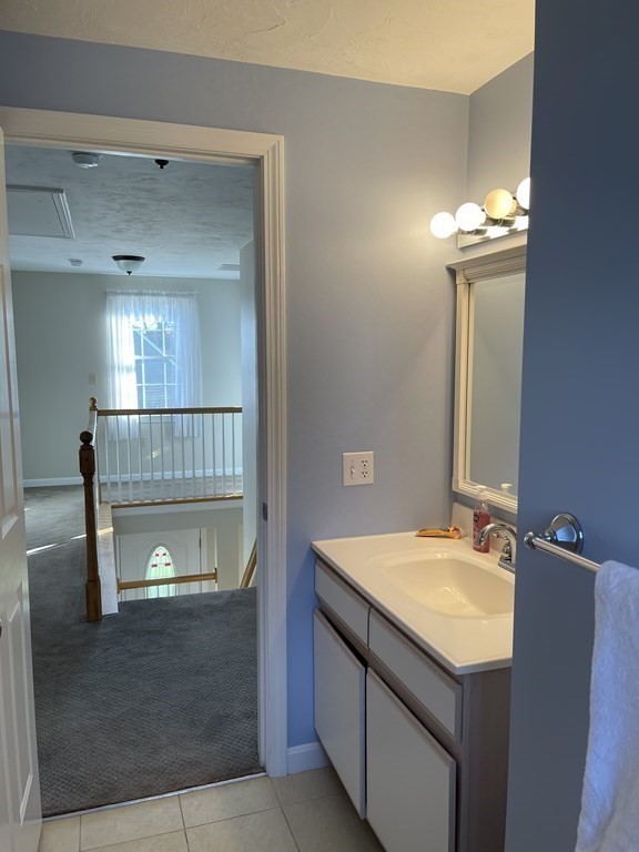 5 Collins Circle Weymouth, MA 02190 - Photo 32 of 42 a bathroom with a sink and a mirror