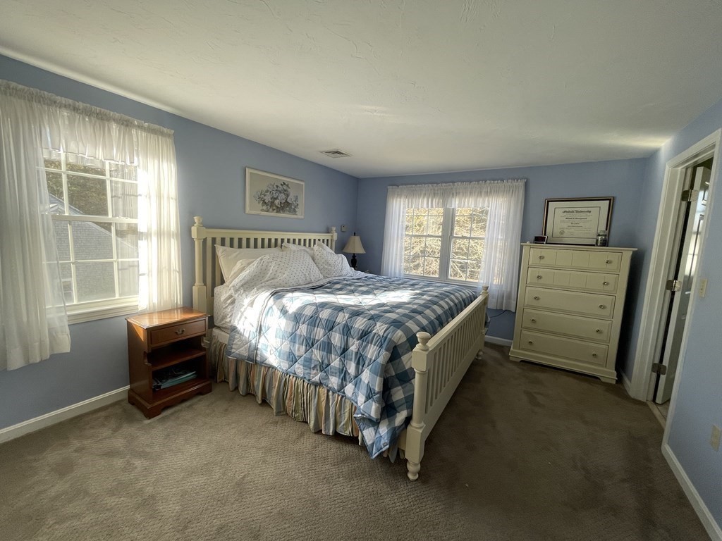 5 Collins Circle Weymouth, MA 02190 - Photo 33 of 42 a bedroom with a bed and a window