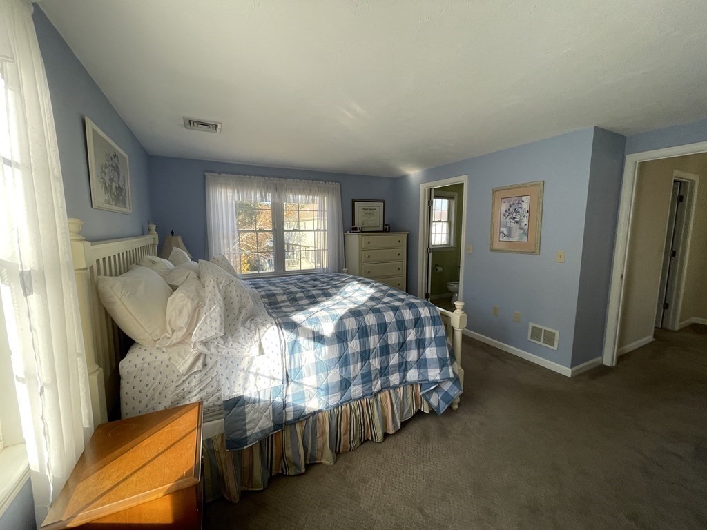 5 Collins Circle Weymouth, MA 02190 - Photo 34 of 42 a bedroom with a bed and window