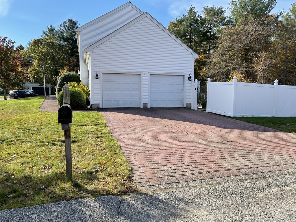 5 Collins Circle Weymouth, MA 02190 - Photo 6 of 42 a view of a back yard of the house