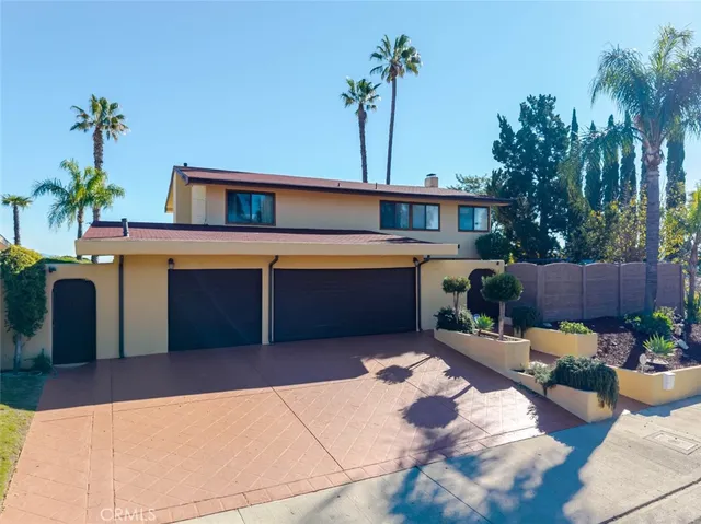 a view of a house with a swimming pool
