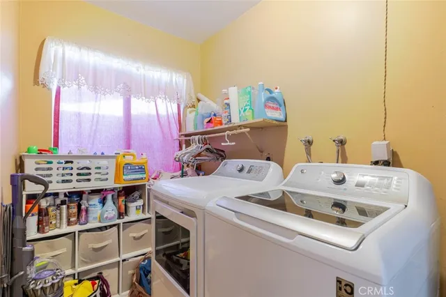a utility room with washer and dryer
