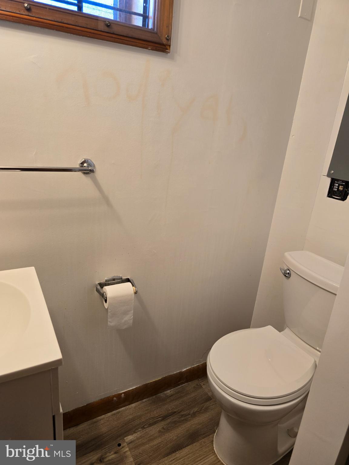 3910 74th Avenue Hyattsville, MD 20784 - Photo 22 of 23 a white toilet sitting next to a shower