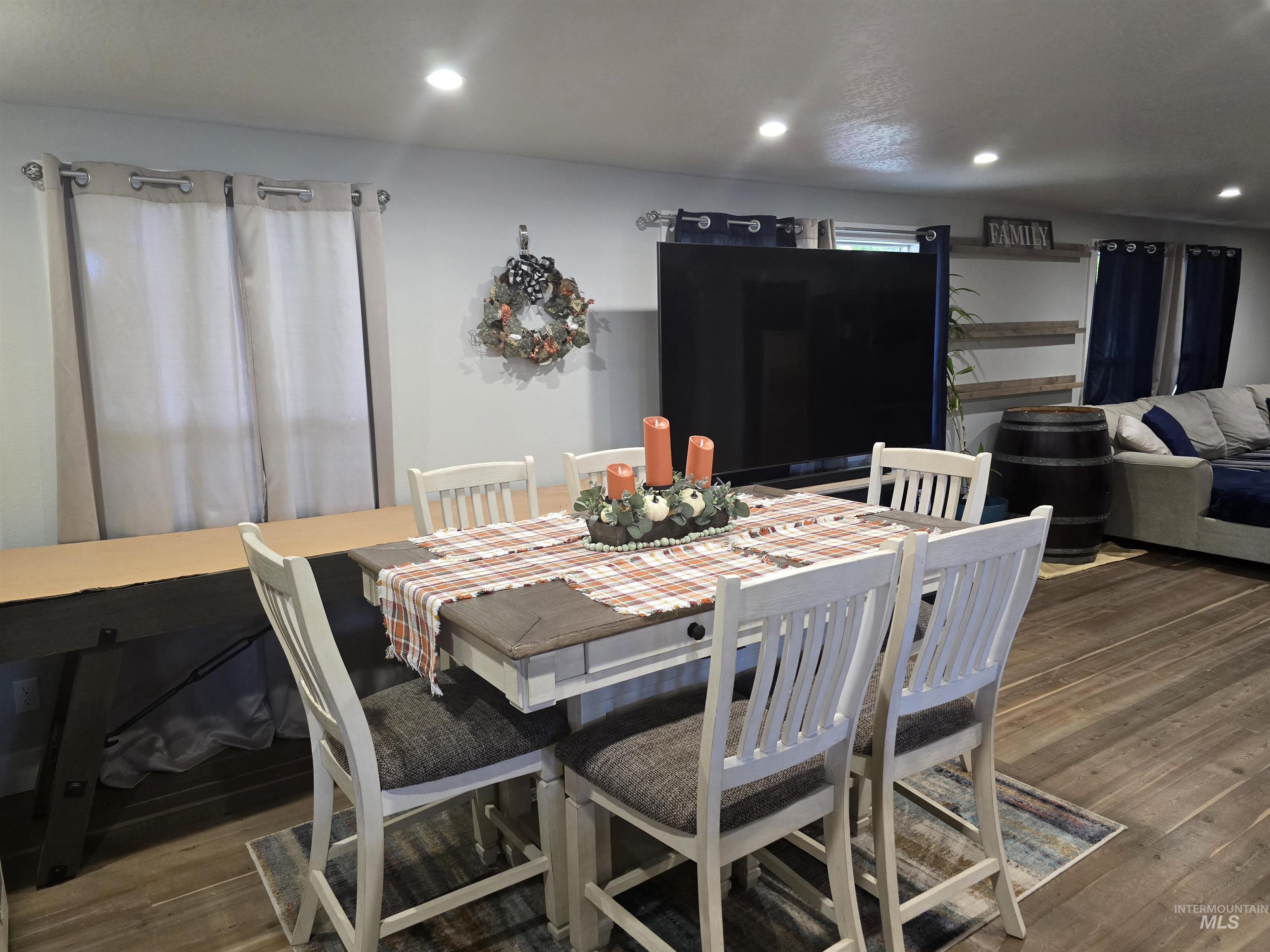 1265 West 1st Street Weiser, ID 83672 - Photo 7 of 23 Dining area featuring dark wood-style flooring and recessed lighting