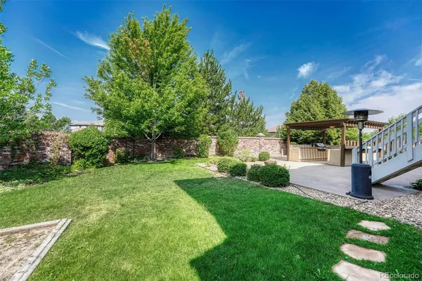 a view of a park with large trees