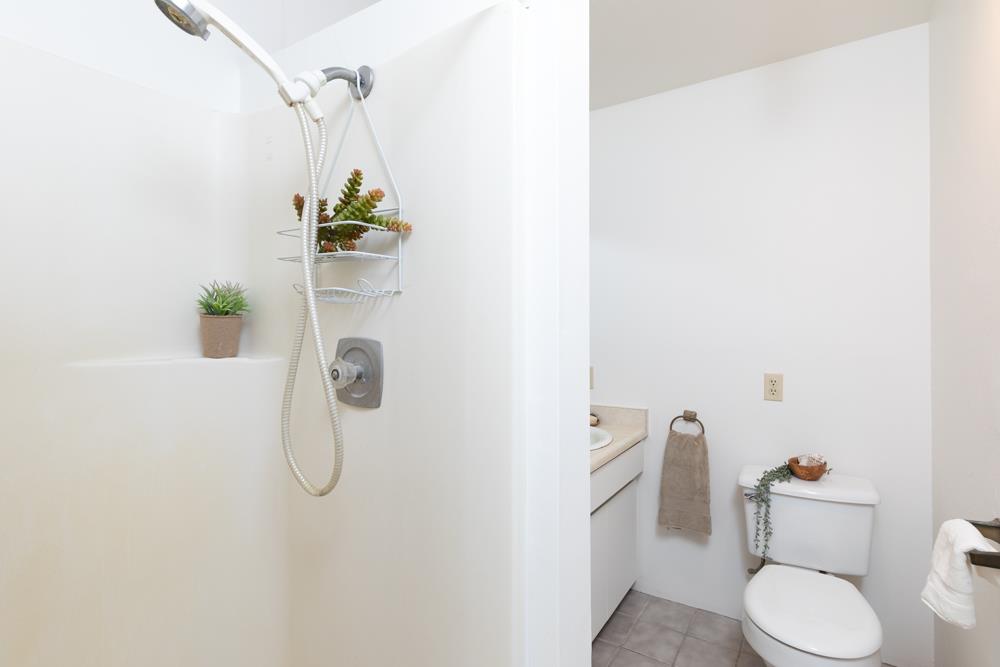 96 Wheelock Road Watsonville, CA 95076 - Photo 15 of 53 a white toilet sitting next to a shower